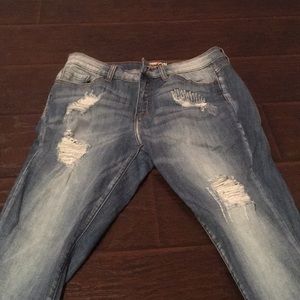 Distressed jeans never worn no stains nor rips